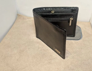 КОЖАНЫЙ МУЖСКОЙ БУМАЖНИК "OCHNIK" SL-122-99